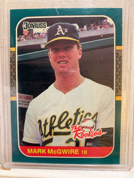 1987-88 DONRUSS BASEBALL #1 - "THE ROOKIES" MARK MCGWIRE ROOKIE CARD RAW