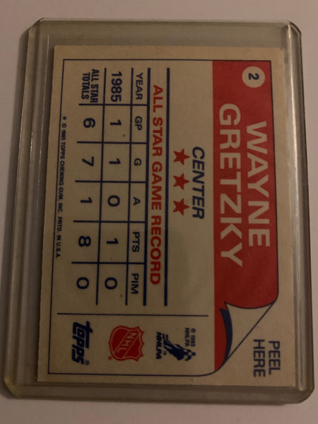 1985-86 TOPPS HOCKEY #2 EDMONTON OILERS - WAYNE GRETZKY STICKER CARD RAW