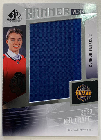 2023-24 UD SP GAME USED HOCKEY #BYDRCB - CONNOR BEDARD BANNER YEAR DRAFT ROOKIE