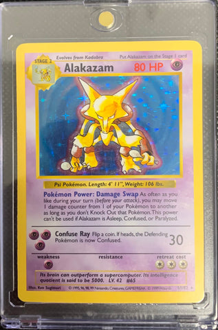 1999 POKEMON BASE SET - ALAKAZAM HOLO 1/102 SHADOWLESS