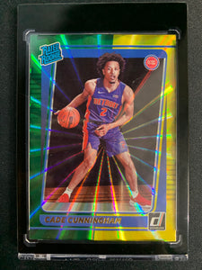 2021-22 PANINI DONRUSS BASKETBALL #211 DETROIT PISTONS - CADE CUNNINGHAM GREEN & YELLOW LASER HOLO ROOKIE CARD