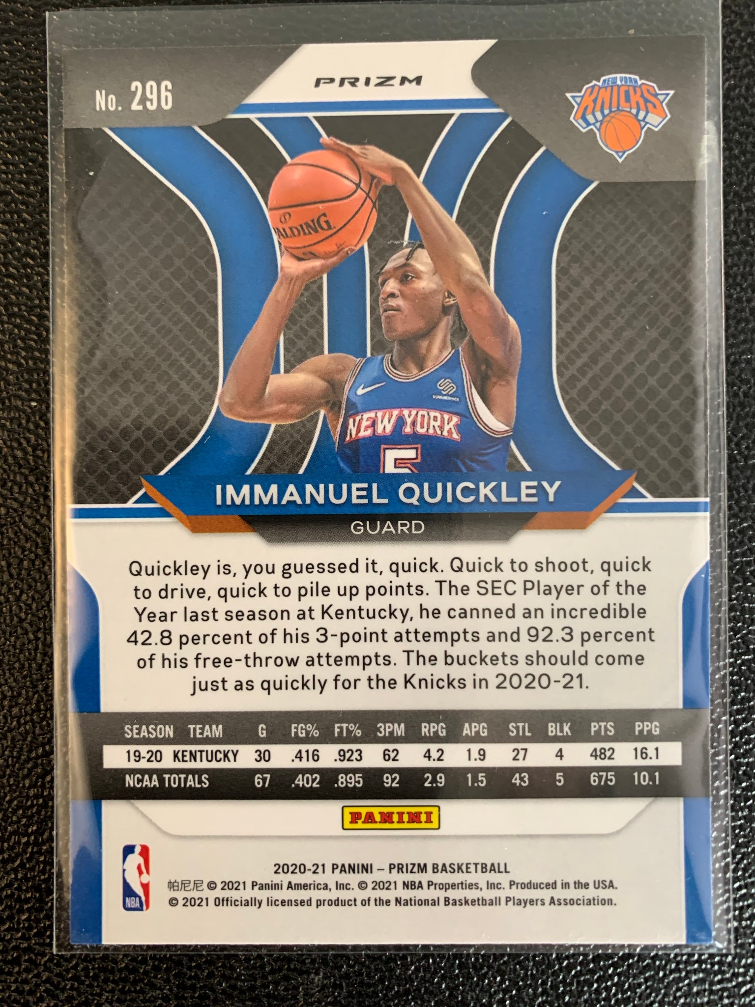 2020-2021 PANINI PRIZM NBA BASKETBALL #296 NEW YORK KNICKS - IMMANUEL QUICKLEY PRIZM RED WHITE & BLUE ROOKIE CARD