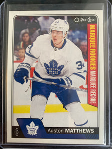 2016-17 UPPER DECK OPC HOCKEY #694 TORONTO MAPLE LEAFS - AUSTON MATTHEWS MARQUEE ROOKIES ROOKIE CARD