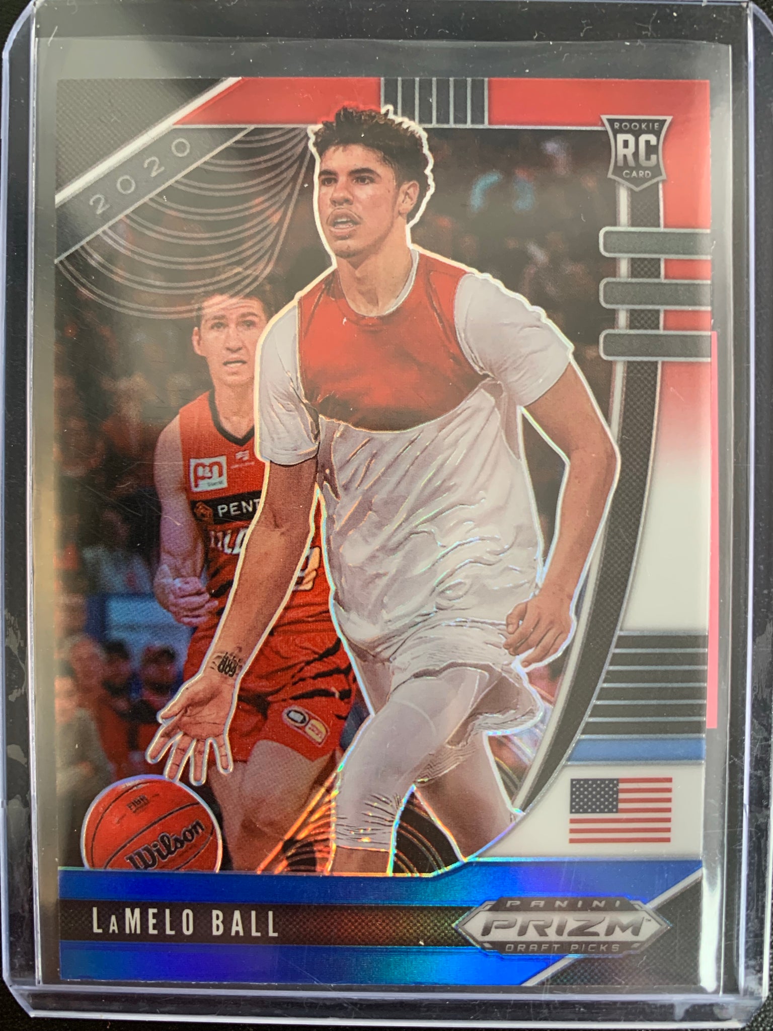 2020 PANINI PRIZM DRAFT PICKS BASKETBALL #43 CHARLOTTE HORNETS - LAMELO BALL RED WHITE AND BLUE PRIZM ROOKIE CARD