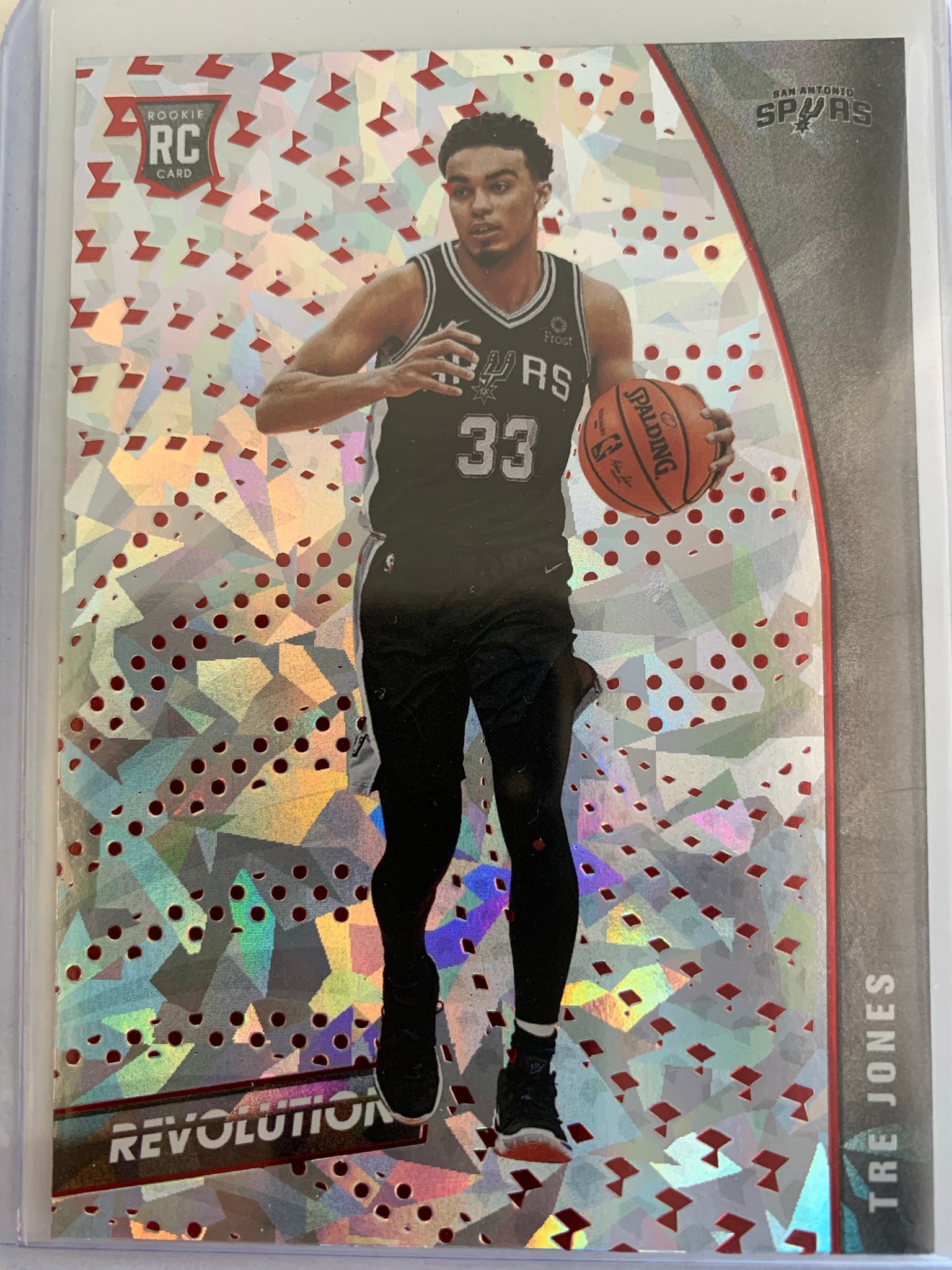 2020-2021 PANINI REVOLUTION NBA BASKETBALL #137 SAN ANTONIO SPURS - TRE JONES CNY CRACKED ICE ROOKIE CARD