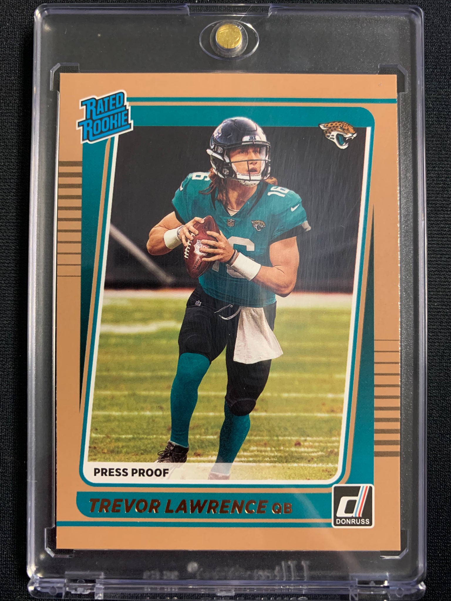 2021 PANINI DONRUSS FOOTBALL #251 JACKSONVILLE JAGUARS - TREVOR LAWRENCE BRONZE PRESS PROOF SP RATED ROOKIE CARD