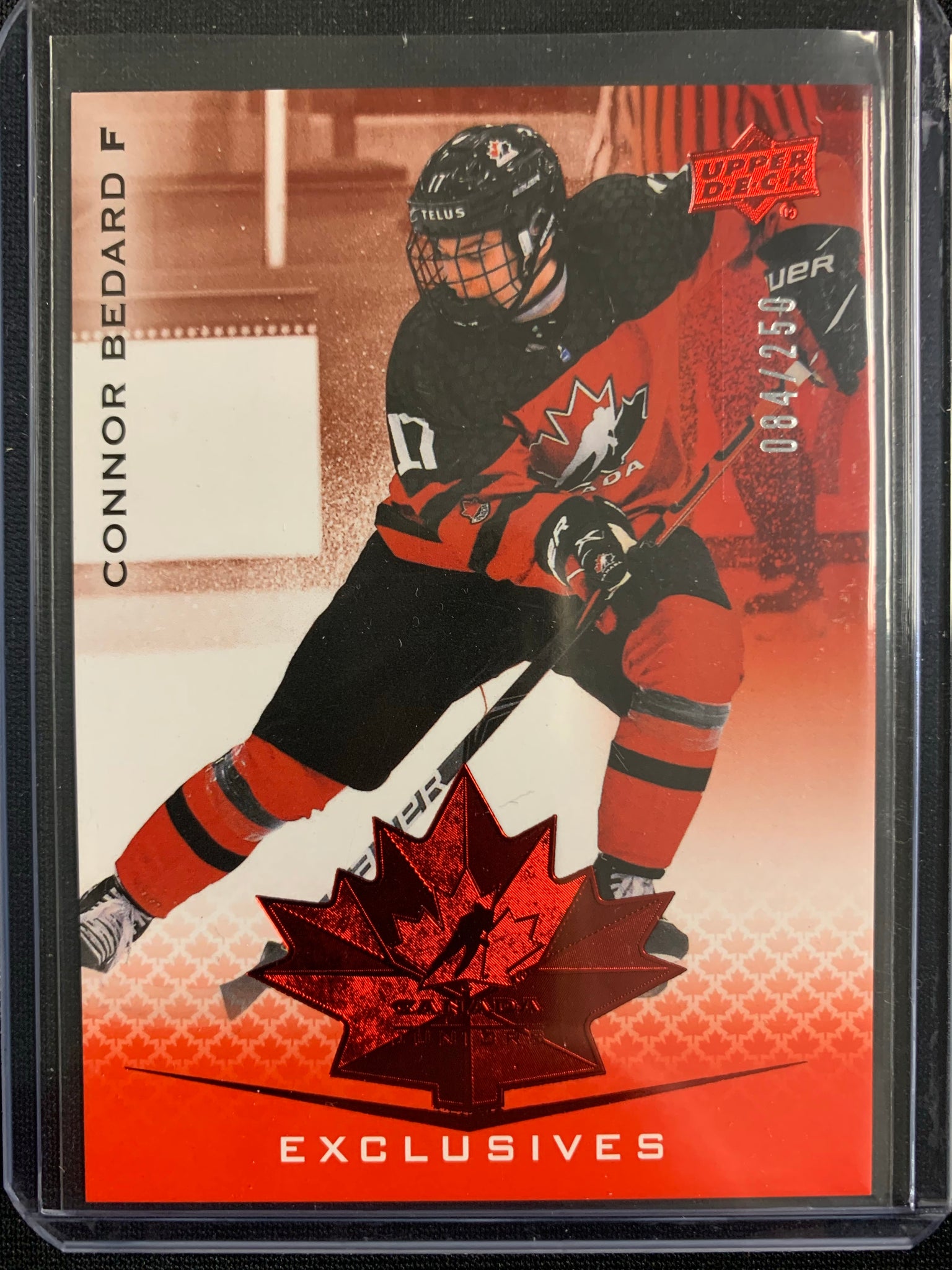 2021 UPPER DECK TEAM CANADA JUNIORS HOCKEY #41 - CONNOR BEDARD EXCLUSIVES RED PARALLEL NUMBERED 084/250