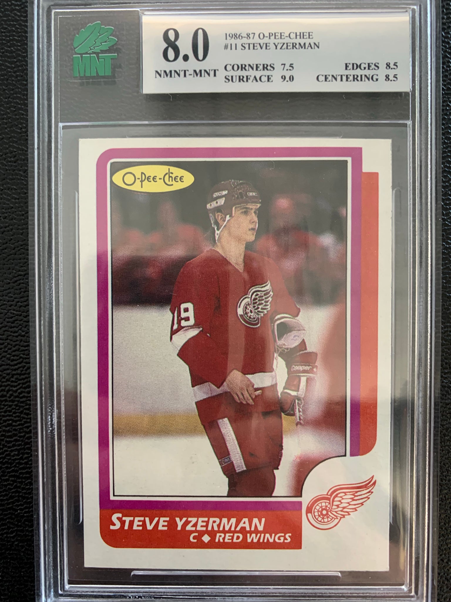 1986-87 O-PEE-CHEE HOCKEY #11 DETROIT RED WINGS - STEVE YZERMAN CARD GRADED MNT 8.0 NMNT-MNT