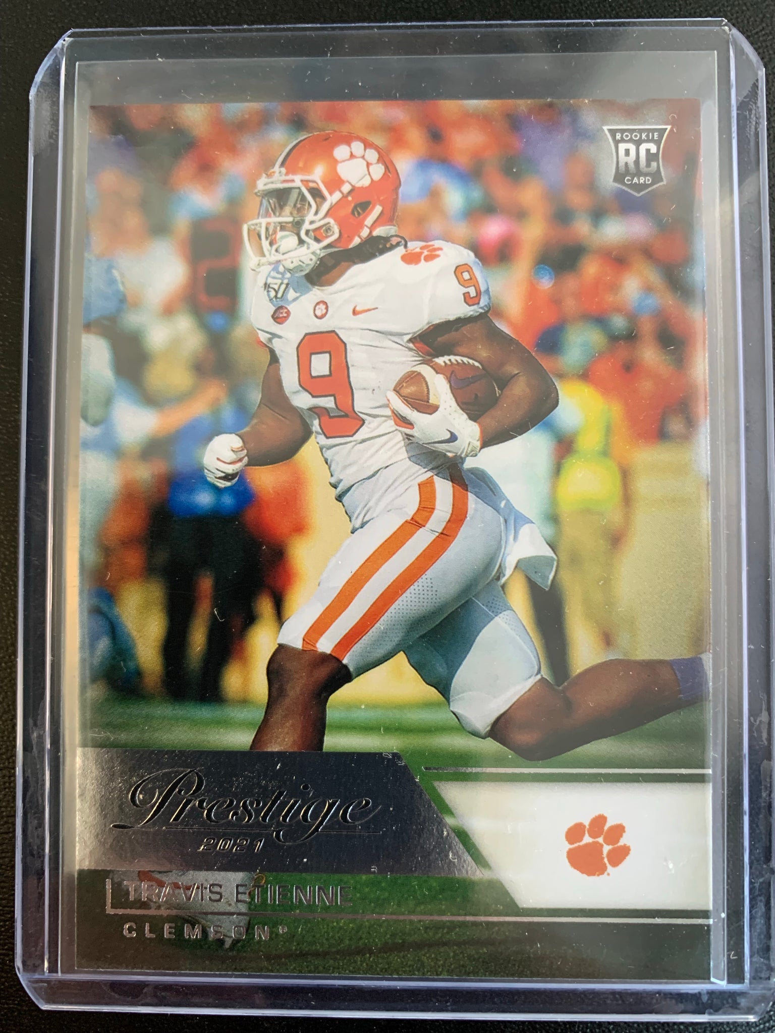 2021 PANINI CHRONICLES DRAFT PICKS FOOTBALL #89 JACKSONVILLE JAGUARS - TRAVIS ETIENNE PRESTIGE ROOKIE CARD