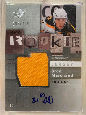 2009-10 UPPER DECK HOCKEY #160 BOSTON BRUINS - BRAD MARCHAND SPX AUTOGRAPHED JERSEY ROOKIE CARD RAW