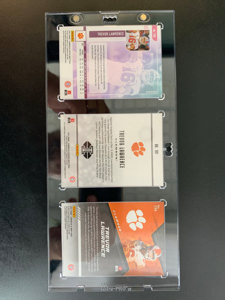 2021 CHRONICLES FOOTBALL - TREVOR LAWRENCE ROOKIE CARD COLLECTION (3) / COMES WITH 1-TOUCH DISPLAY CASE