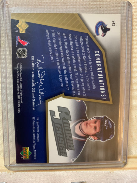 2005-06 SPX HOCKEY #242 VANCOUVER CANUCKS - KEVIN BIEKSA SPX AUTOGRAPHED JERSEY ROOKIE CARD RAW